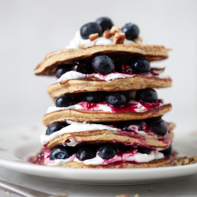 Banana oat pancakes with berry compote