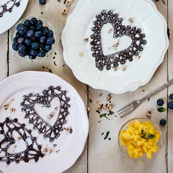 Chocolate Lace Pancakes with Mango, Blueberries and Yoghurt