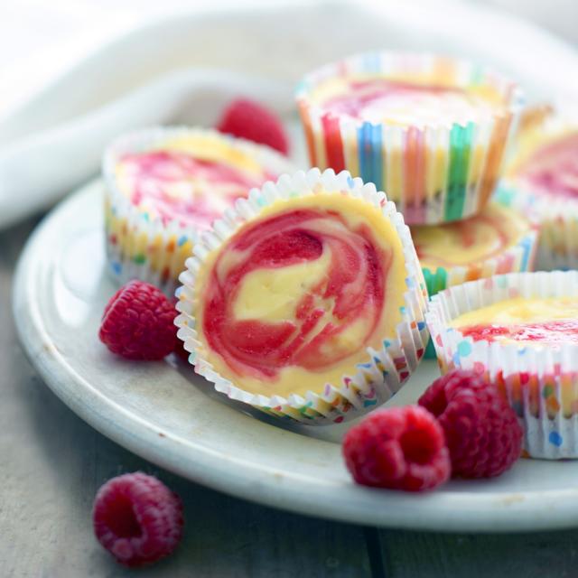 Mini raspberry swirl cheesecakes