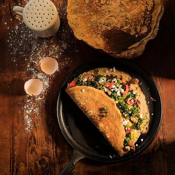 Spinach Pancakes with Leeks, Kale, Pepper and Caramelized Walnuts